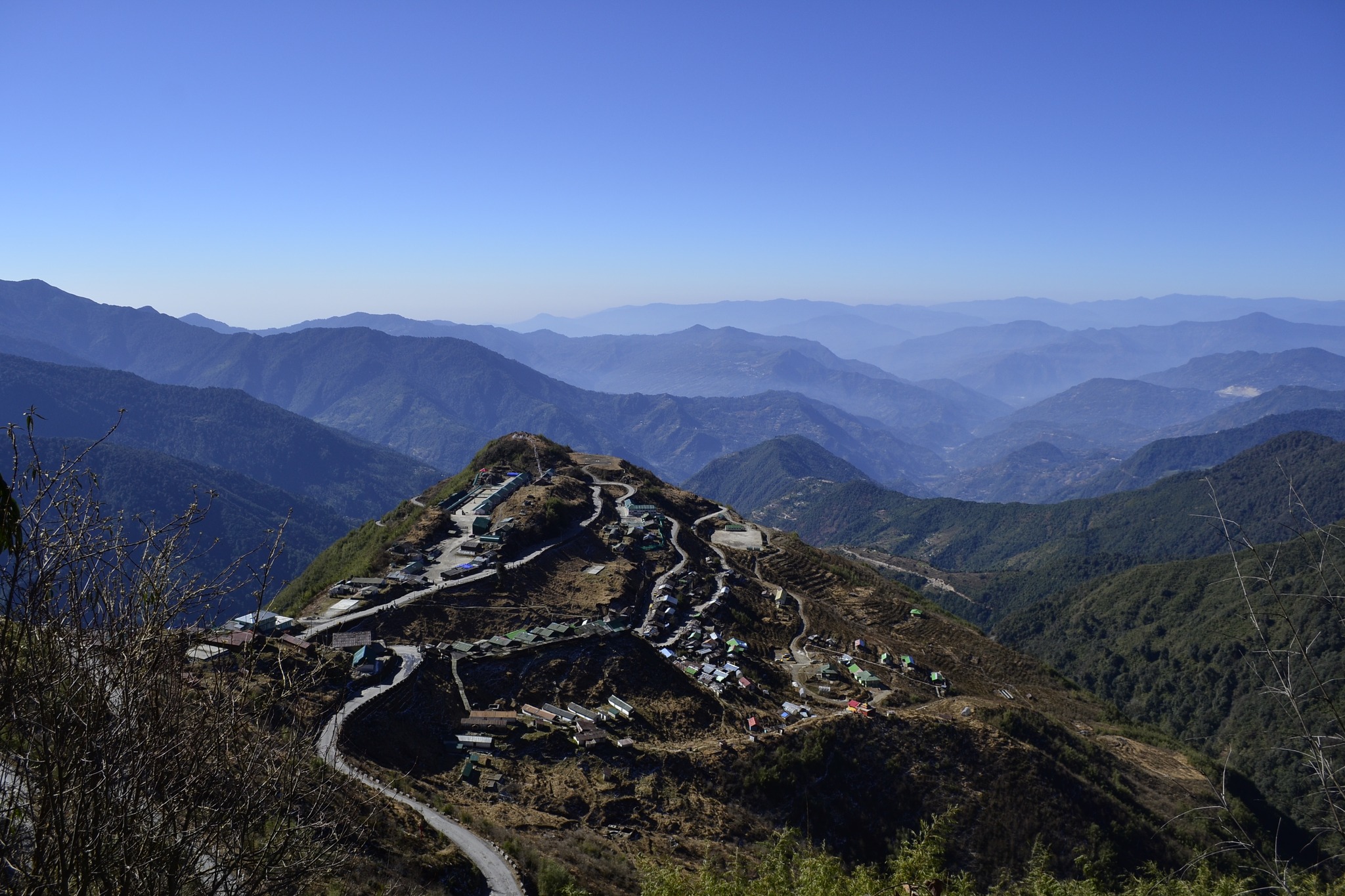 Silk Route road view with Himalayan mountains and winding roads